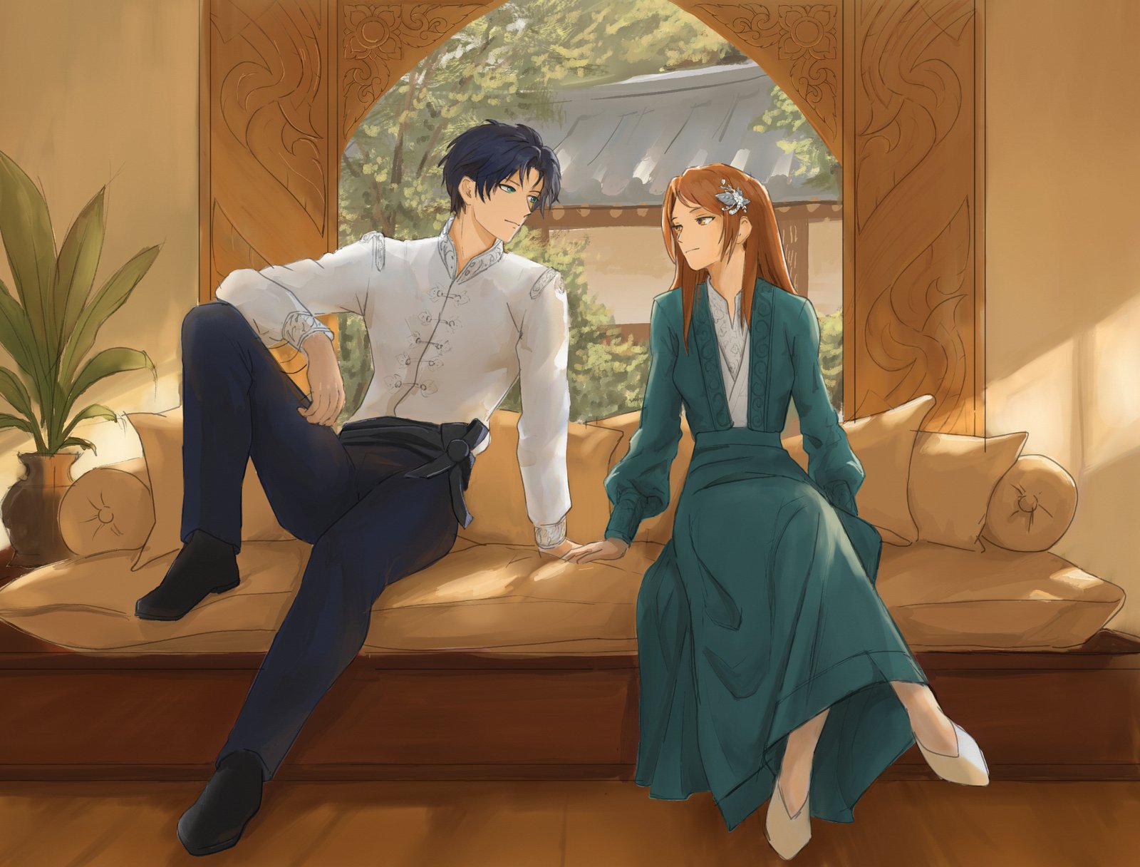 Sein & Zeya sitting together on the daybed